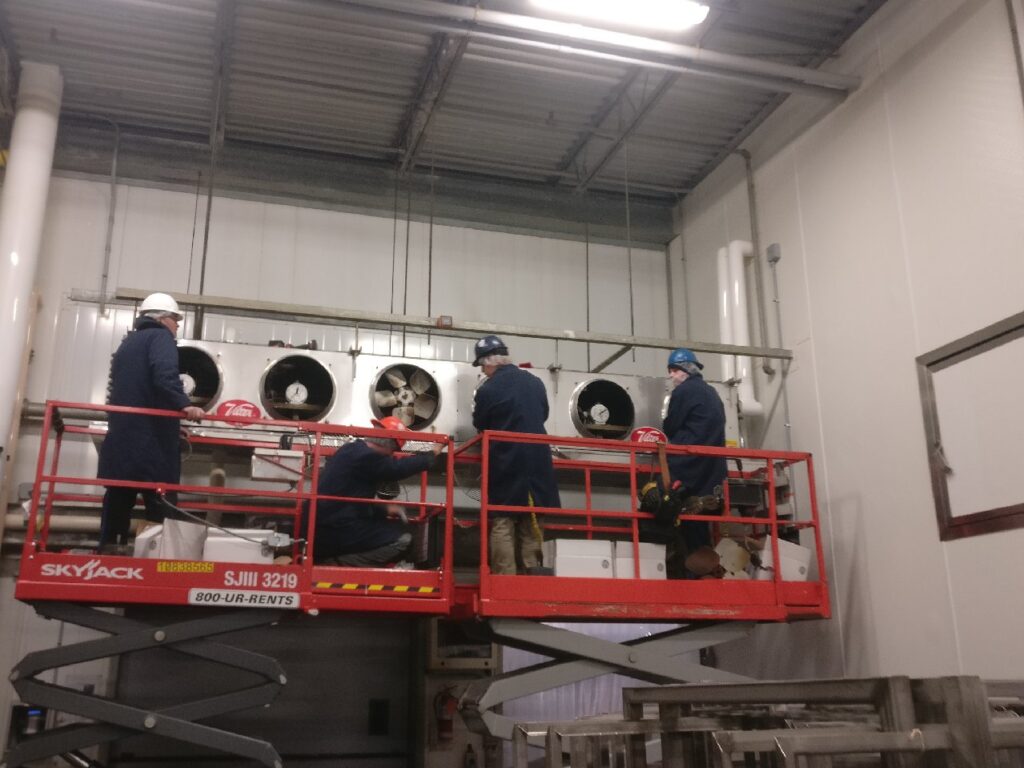 HVAC refrigeration Techs working on Longos fans